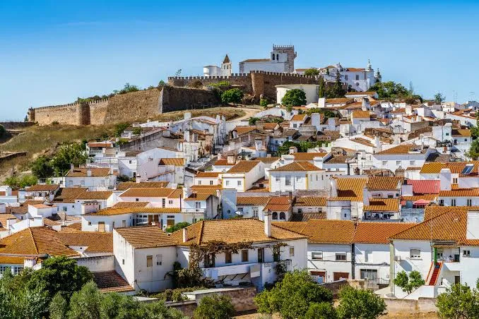 Whitewashed rooftops of Estremoz below the castle walls