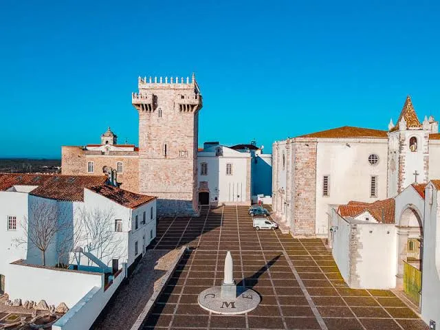 Estremoz castle keep and the paved square below, seen from above