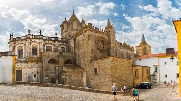 Cathedral facade and rooftops in Évora